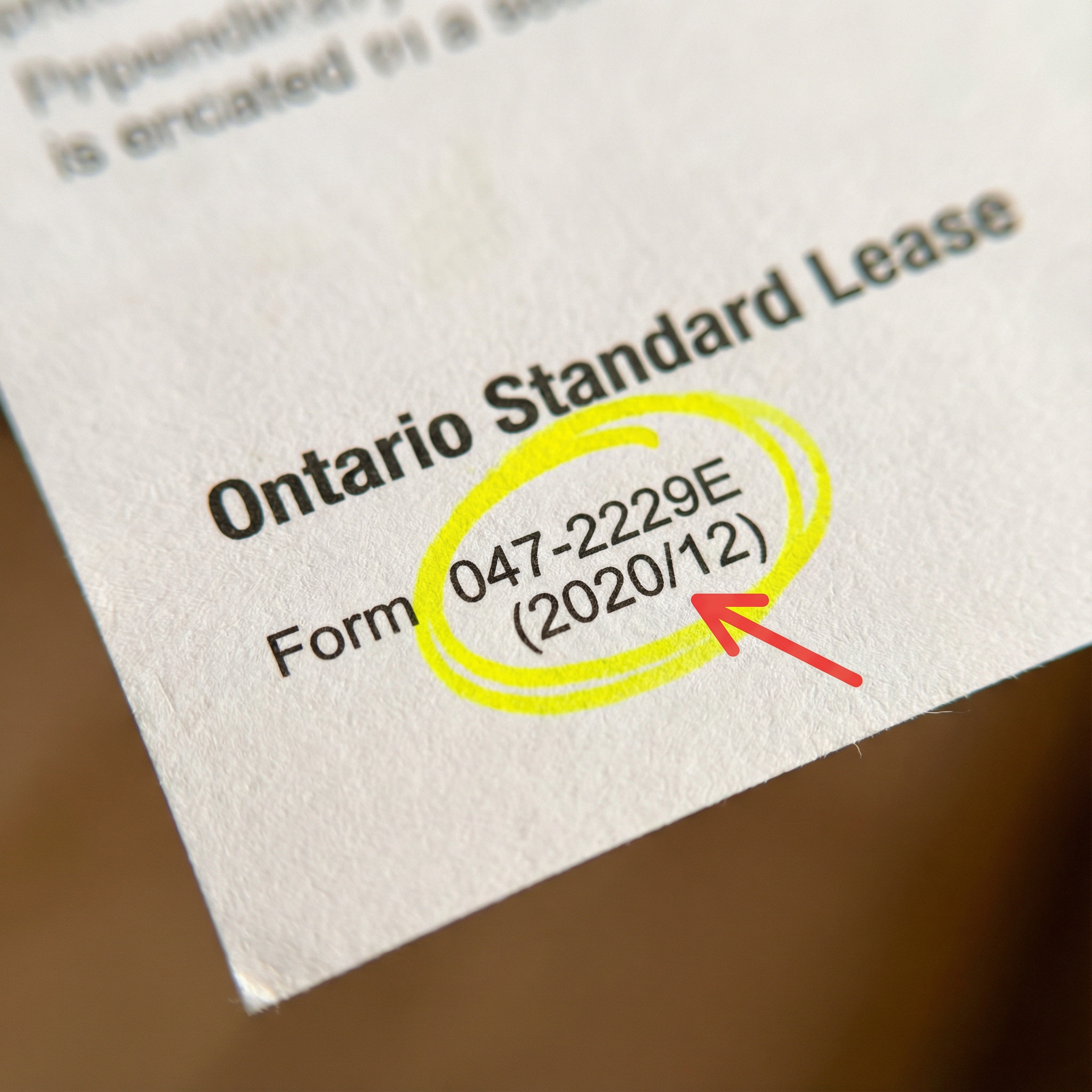 Square format showing the official Ontario Standard Lease form header with Form 047-2229 and December 2020 date circled/highlighted. Arrow pointing to the version indicator.